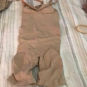 Skims sculpting mid thigh short bodysuit